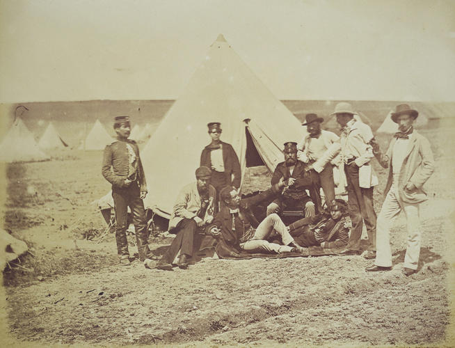 Group outside a small tent