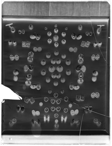 Glass plate negative of links and studs belonging to George V