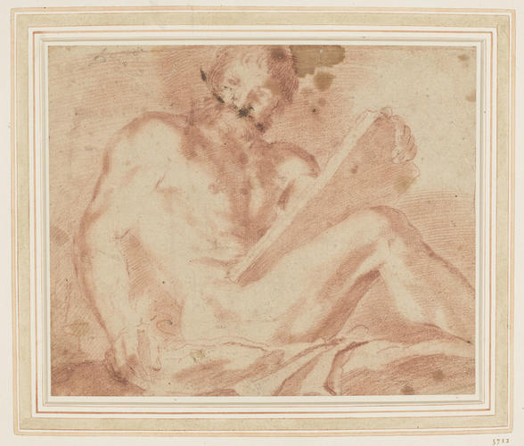 A male nude holding a tablet and a candle A male nude holding a tablet and a candle