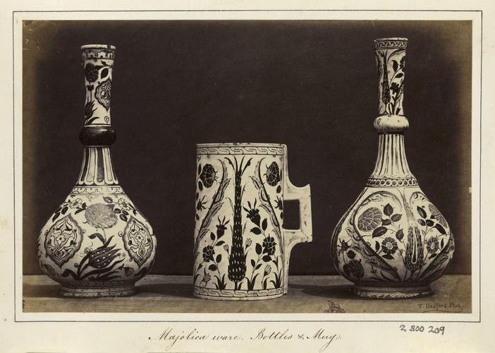 'Majolica Ware. Bottles and Mug'