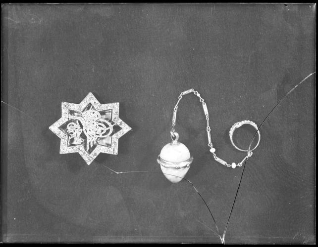 Glass plate negative of a brooch and a viniagrette, given to Queen Victoria Glass plate negative of a brooch and a viniagrette, given to Queen Victoria