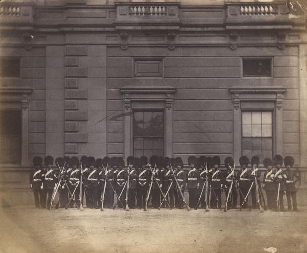 Grenadier Guards mounting guard at Buckingham Palace